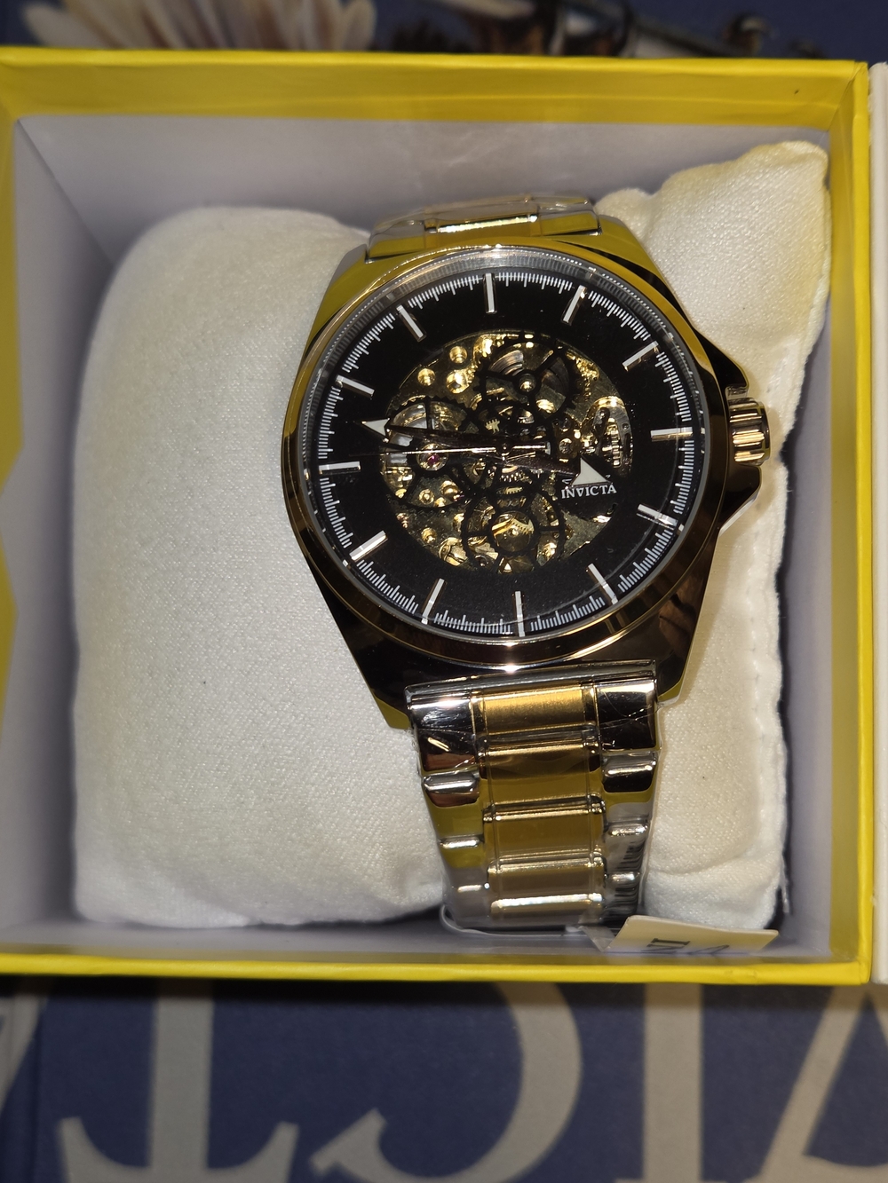 Invicta Men’s Automatic Gold and Silver Skeleton Dial Watch